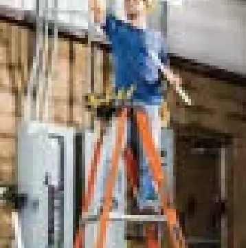 Electrician working from a ladder — from the Fastening House catalog